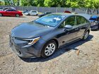 2025 Toyota Corolla Hybrid Le Gray vin: JTDBCMFE6S3093344