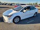 2026 Toyota Corolla Hybrid Le White vin: JTDBCMFEXT3138237