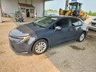 2026 Toyota Corolla Hybrid Le Gray vin: JTDBDMHE9T3028080