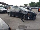 2021 Toyota Corolla Hybrid Le Black vin: JTDEAMDE4MJ034295