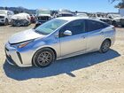 2021 Toyota Prius L Eco Silver vin: JTDKAMFU2M3142247