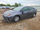 2021 Toyota Prius L Eco Gray vin: JTDKAMFU2M3143835