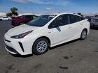 2021 Toyota Prius Le White vin: JTDKAMFU3M3144153