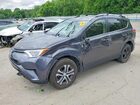 2016 Toyota Rav4 Le Gray vin: JTMBFREV9GJ102109
