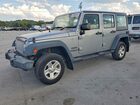 2016 Jeep Wrangler Unlimited Sport Silver vin: 1C4BJWKG7GL200305