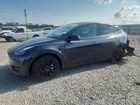 2024 Tesla Model Y Black vin: 7SAYGAEE1RF033325