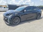 2025 Tesla Model Y Black vin: 7SAYGAEE5SF296875