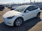 2023 Tesla Model Y White vin: 7SAYGAEE7PF624613