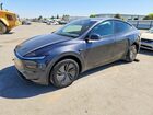 2026 Tesla Model Y Black vin: 7SAYGDED1TF660140