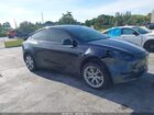 2024 Tesla Model Y   Gray vin: 7SAYGDED6RF077264