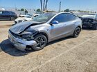 2026 Tesla Model Y Silver vin: 7SAYGDED7TF389469