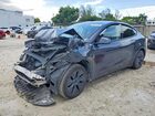 2025 Tesla Model Y Black vin: 7SAYGDED8SF231737
