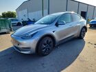 2024 Tesla Model Y Silver vin: 7SAYGDEE0RA299790