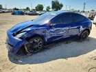 2024 Tesla Model Y Blue vin: 7SAYGDEE3RF068448