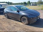 2026 Tesla Model Y All-wheel Drive/long Range Launch Series/premium All-wheel Drive Pewter vin: 7SAYGDEE4TA443185