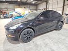 2024 Tesla Model Y Black vin: 7SAYGDEE5RA304983