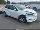 2023 Tesla Model Y Awd/long Range Dual Motor All-wheel Drive White vin: 7SAYGDEE6PF597583