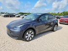 2024 Tesla Model Y Gray vin: 7SAYGDEE6RA282508