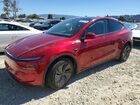 2026 Tesla Model Y Red vin: 7SAYGDEE7TF395183
