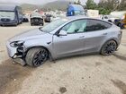 2024 Tesla Model Y Silver vin: 7SAYGDEF3RA296682