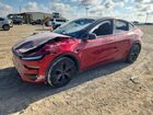 2026 Tesla Model Y Red vin: 7SAYGDET9TA672492