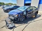 2026 Toyota Corolla Hybrid Le Blue vin: JTDBCMFE0T3130454