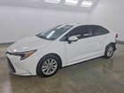 2024 Toyota Corolla Hybrid Le White vin: JTDBCMFE3R3062479