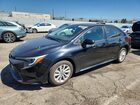 2024 Toyota Corolla Hybrid Le Black vin: JTDBCMFEXR3055237