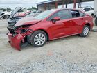 2025 Toyota Corolla Hybrid Le Red vin: JTDBCMFEXS3079821