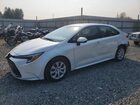2025 Toyota Corolla Hybrid Le White vin: JTDBDMHEXS3019578