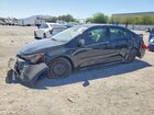 2022 Toyota Corolla Le Black vin: JTDEPMAE5NJ206385