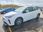 2021 Toyota Prius Le White vin: JTDKAMFU0M3152386