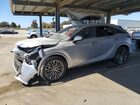 2024 Lexus Rx 450h+ Luxury Silver vin: JTJCJMGA7R2012595